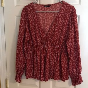 Red deep v-neck blouse